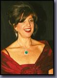 Michele Hodges featured in an elegant ruby gown designed by Troy Michigan's Linda Shears: www.lindashears.com